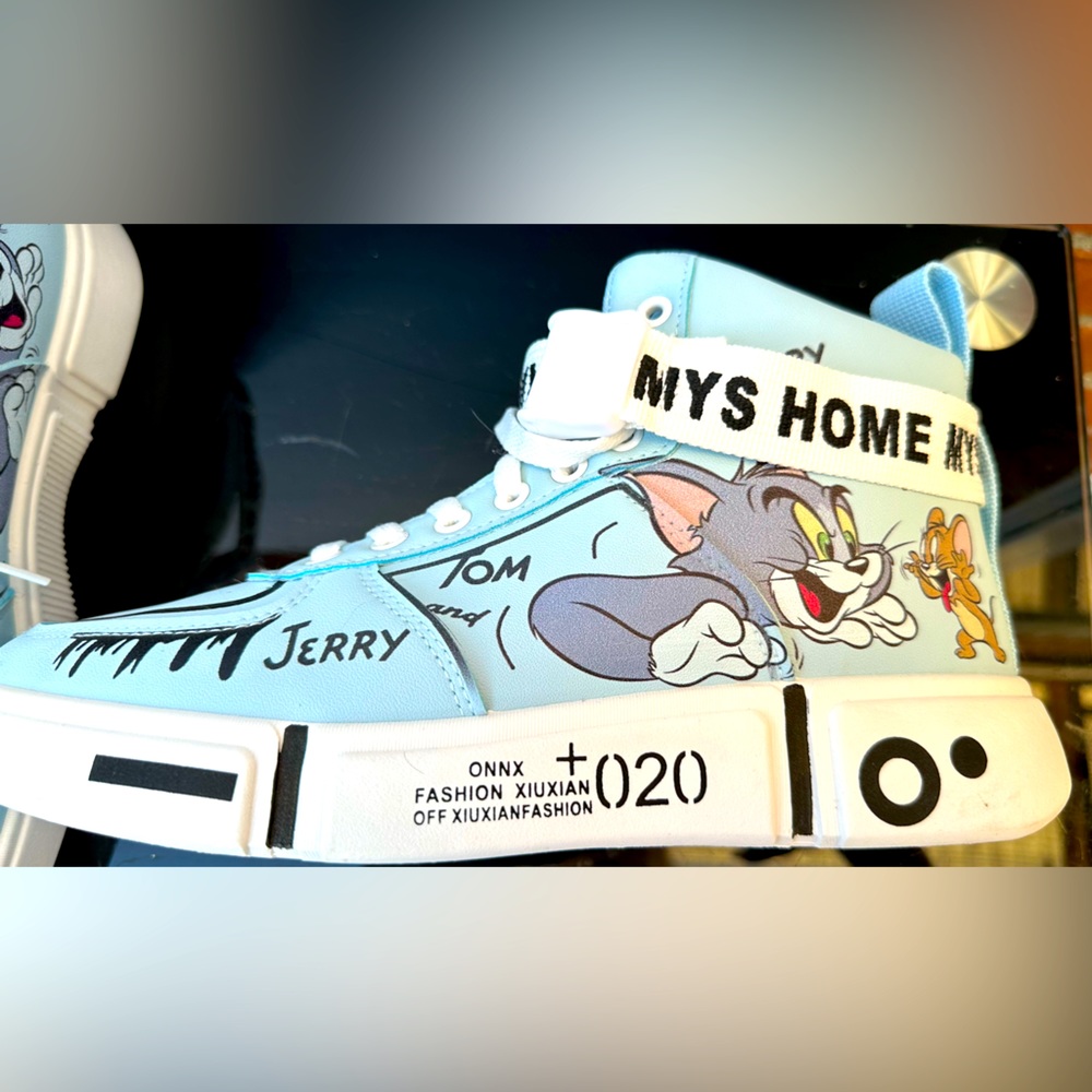 Tom and Jerry blue sneakers. New without tags or box.